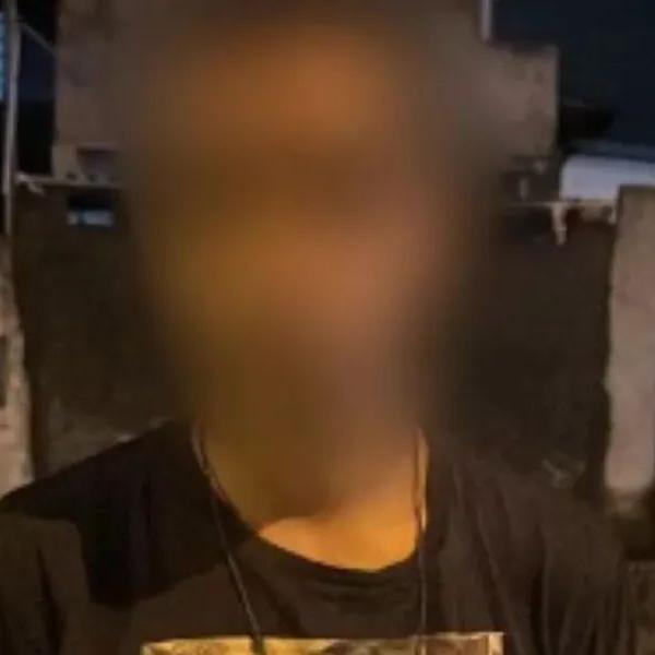 O celular estava no bolso da bermuda do suspeito