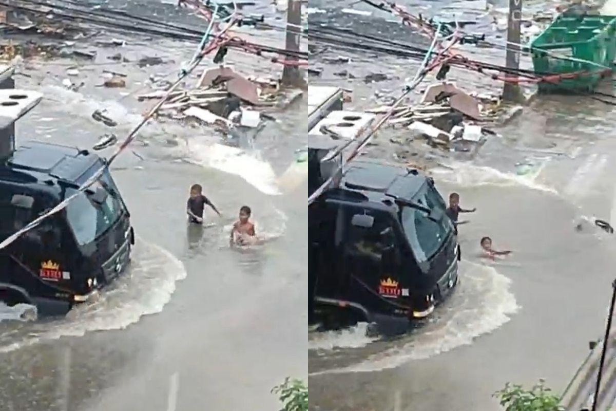 Crianças são arrastadas por enxurrada ao tentar “pegar onda” de caminhão em cruzamento de Guarujá, no litoral de São Paulo; VÍDEO