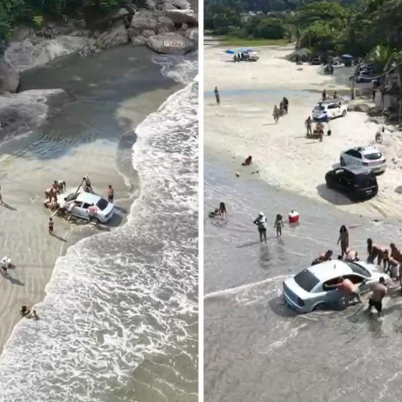 Carro do tipo sedã ficou atolado na praia do Perequê, em Guarujá
