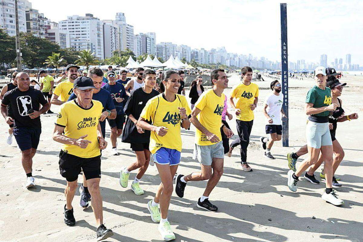 Marilson dos Santos conduziu treino especial pela orla de Santos na manhã deste sábado (16), véspera dos 10 KM Tribuna-Terracom
