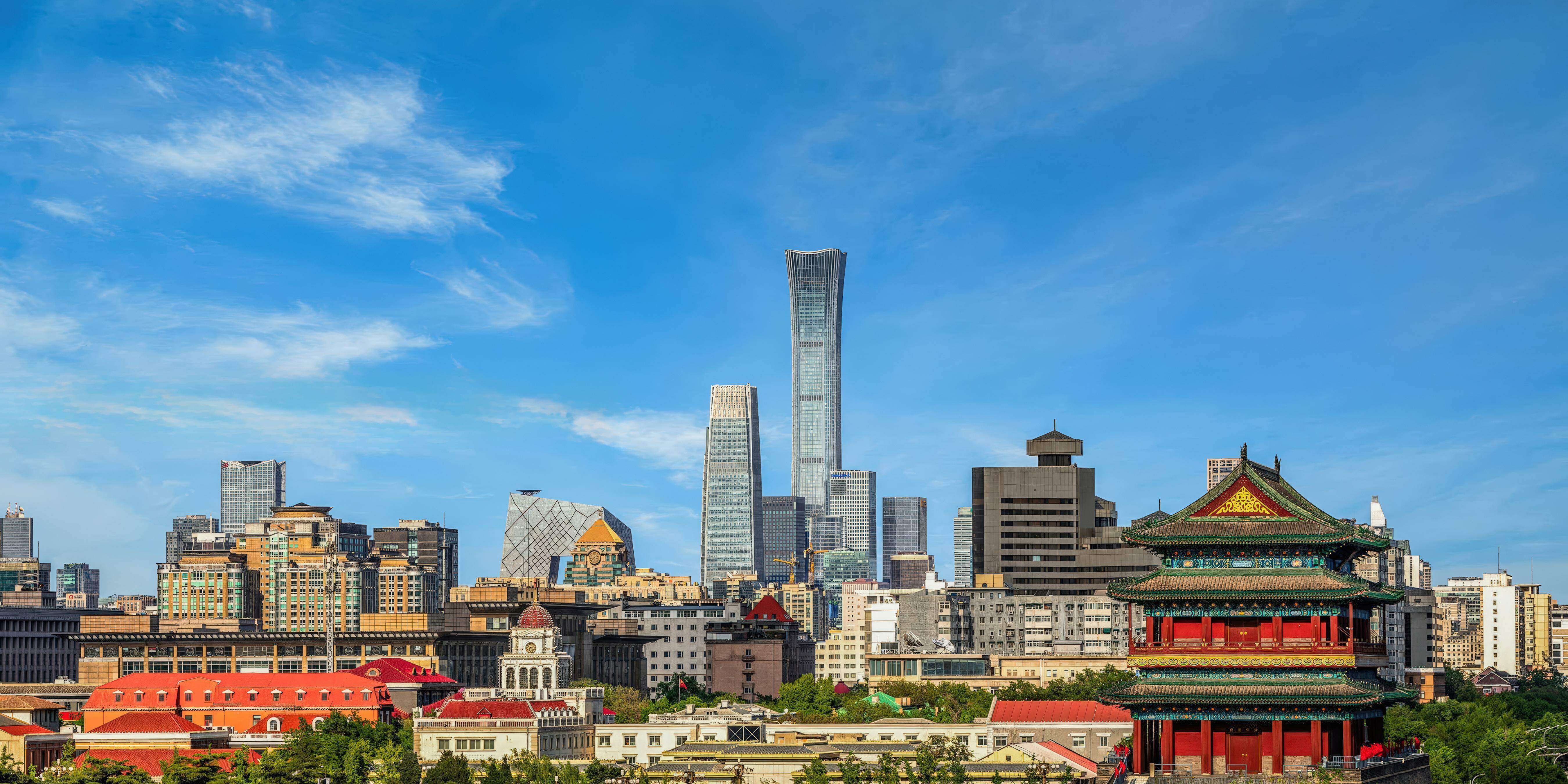 Panoramic view of the city of Beijing, featuring the historic Zhengyangmen Gate and the modern Citic Tower