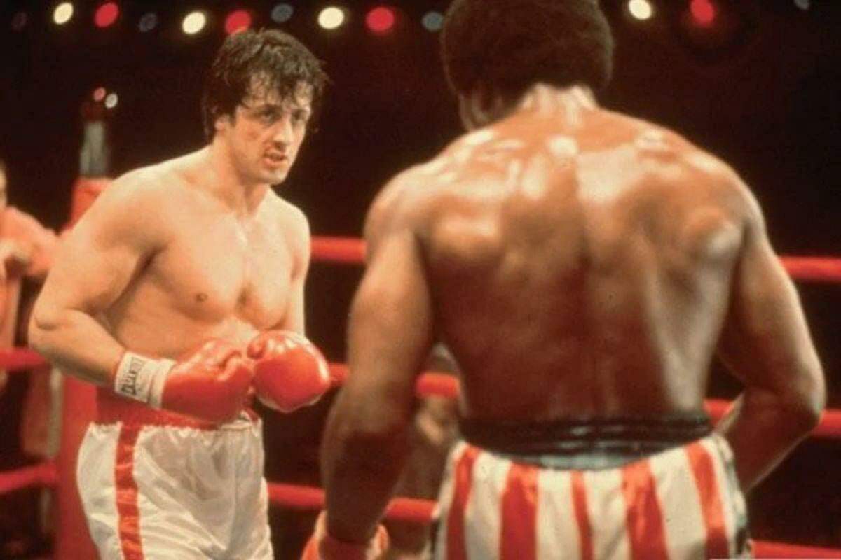 Sylvester Stallone e Carl Weathers em Rocky: Um Lutador (1976)