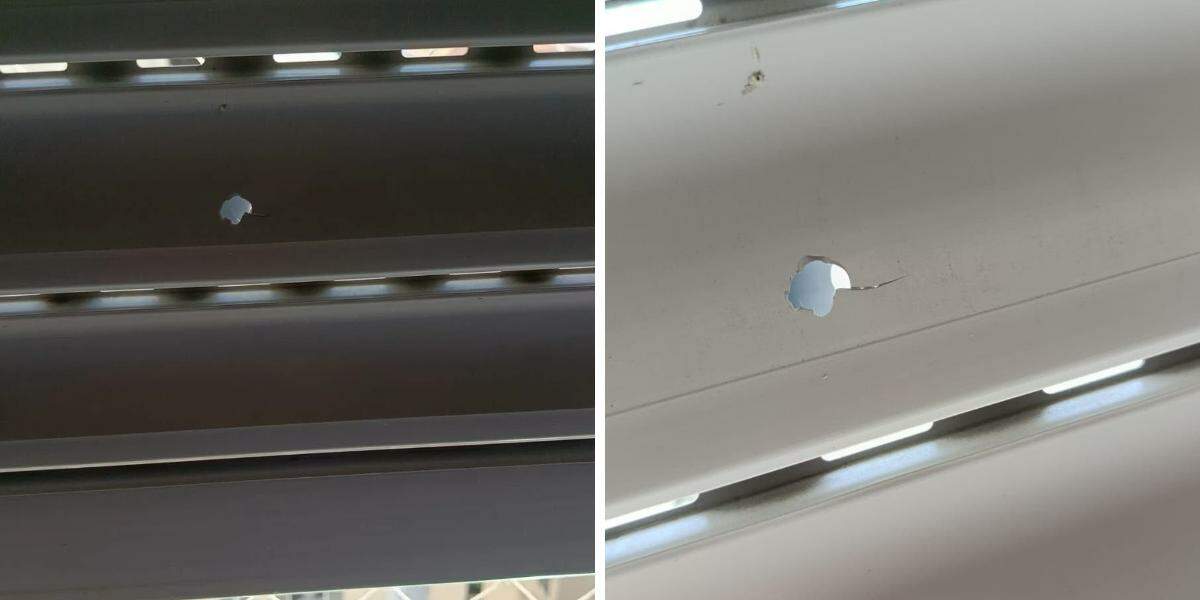 Persiana de apartamento na avenida da praia de Santos apresenta perfurações que, segundo o morador, foram provocadas por disparos de chumbinho