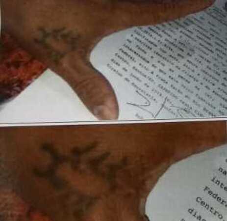 Uma tatuagem na mão foi dada como certeza de que se tratava do condenado nas filmagens 